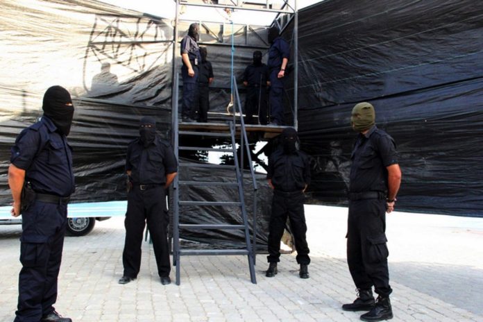 Hamas-Exekutionskommando. Foto Alresalah / Facebook