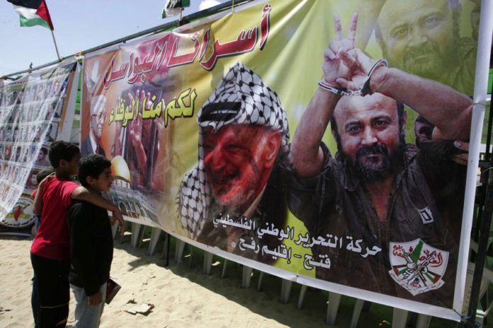 Poster mit Arafat und Marwan Barghouti. Foto Abed Rahim Khatib/Flash90