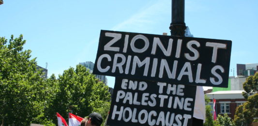 Foto Takver - originally posted to Flickr as Melbourne Gaza protest: Zionist Criminals, End the Palestine Holocaust, CC BY-SA 2.0, https://commons.wikimedia.org/w/index.php?curid=5797044