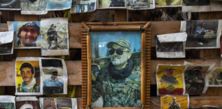 Symbolbild. Eine Wand mit Bildern von Hisbollah-"Märtyrern" am Montag, 17. Mai 2021, im Vorort Haret Hreik südlich von Beirut, Libanon. Foto IMAGO / ZUMA Wire