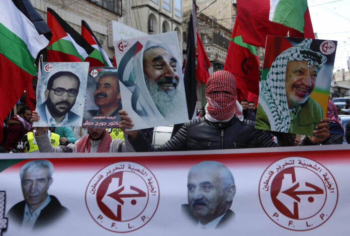 Anhänger der Volksfront für die Befreiung Palästinas (PFLP) an einer Kundgebung zum 54. Jahrestag ihrer Gründung in der Stadt Nablus am 18. Dezember 2021. Foto IMAGO / ZUMA Wire